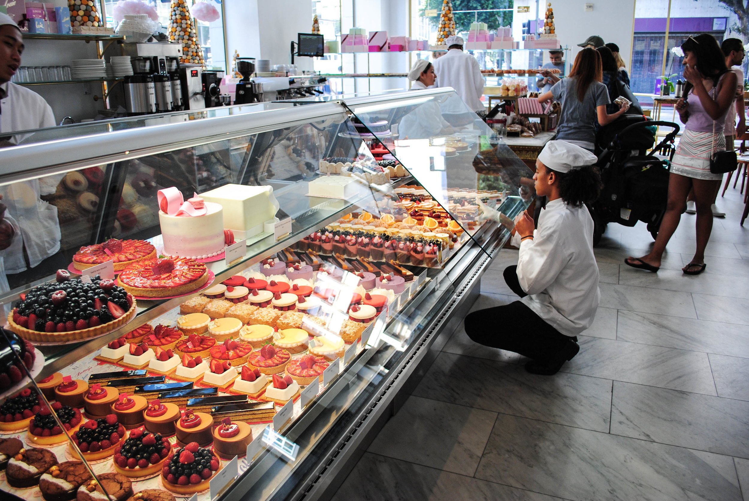 Pastry case at a restaurant, neatly arranged and ready for service