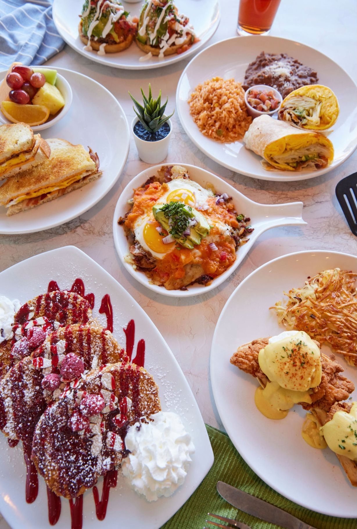 Brunch plates on a restaurant table seen from above