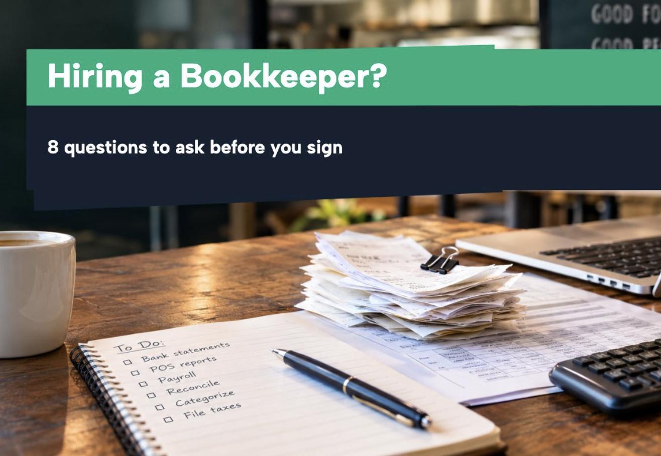 Restaurant bookkeeper hiring checklist on a desk with receipts and a laptop